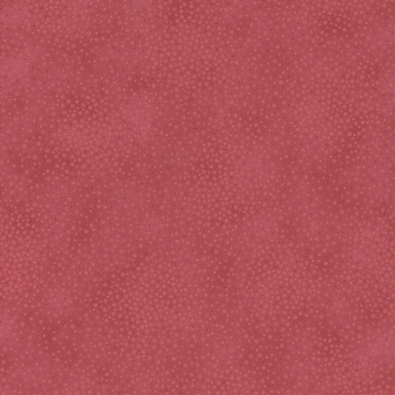 Dusty mauve tonal fabric with meandering dots and spots all over a mottled background