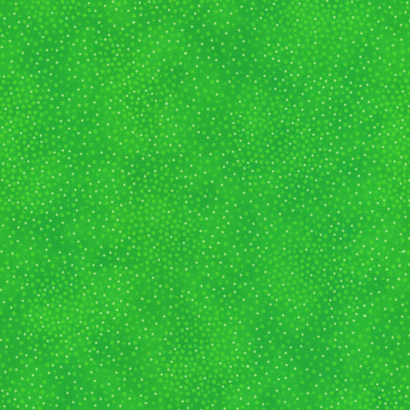 Bright green tonal fabric with meandering dots and spots all over a mottled background