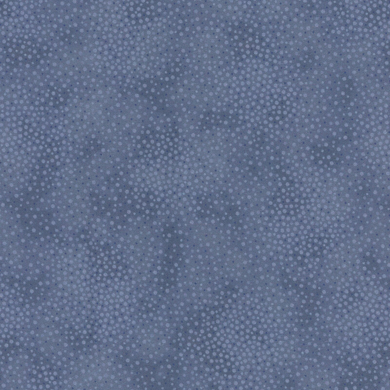 Pale blue tonal fabric with meandering dots and spots all over a mottled background