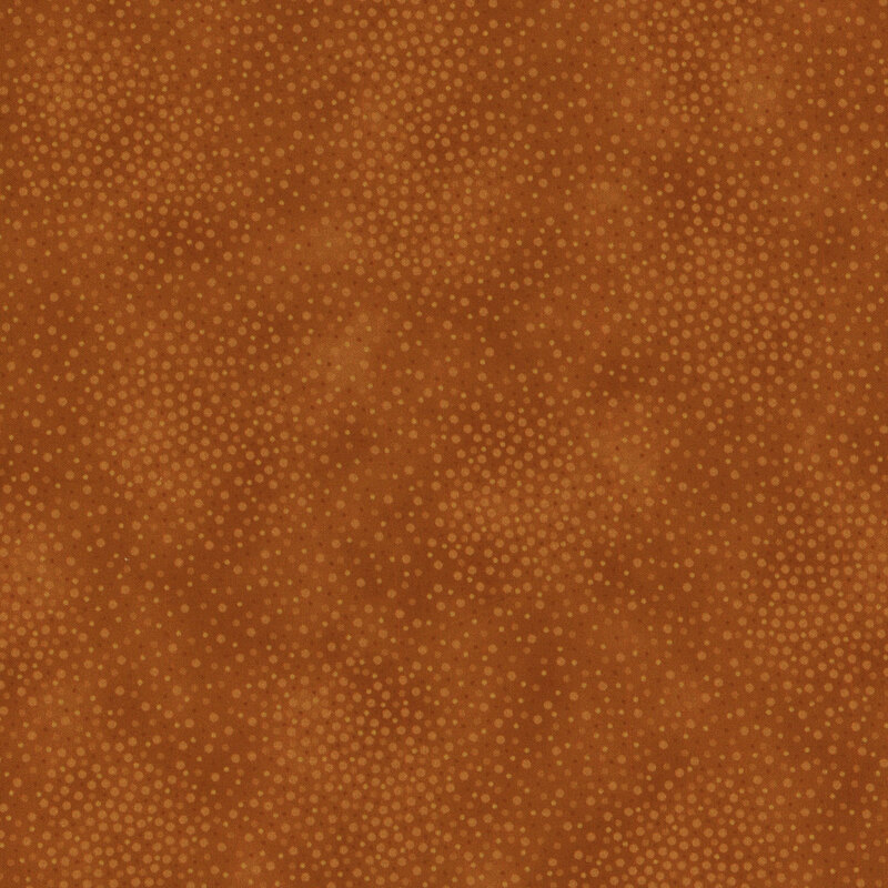 Brown fabric with meandering dots and spots all over a mottled background