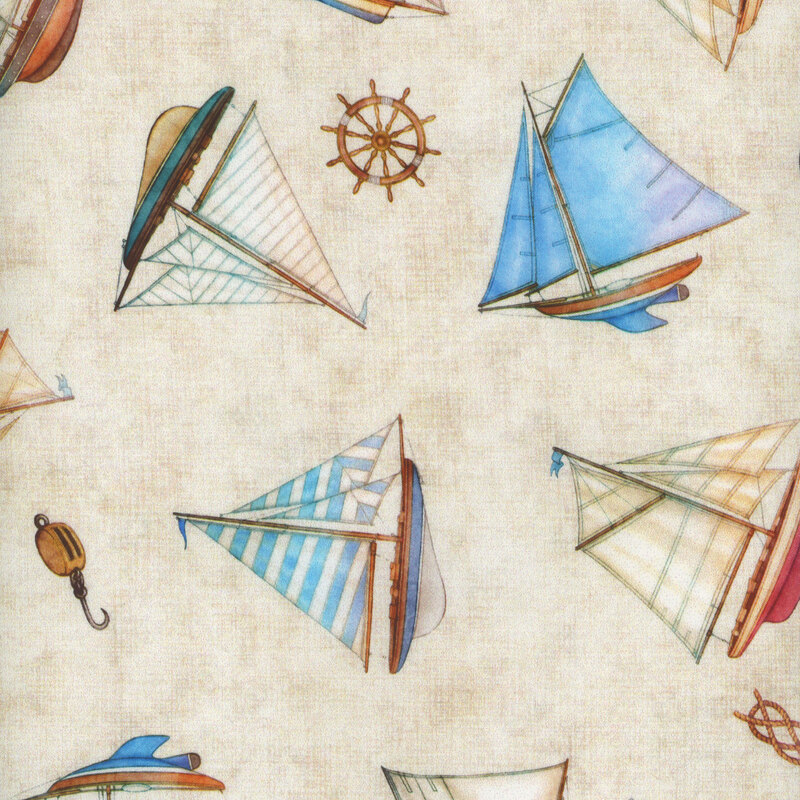 A cream fabric with tossed sailboats, anchors, and other nautical motifs with a distressed texture background