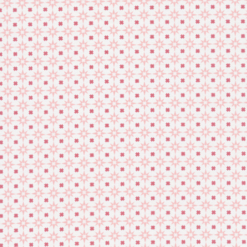 White fabric with light pink connected stars and medium pink stars in the center