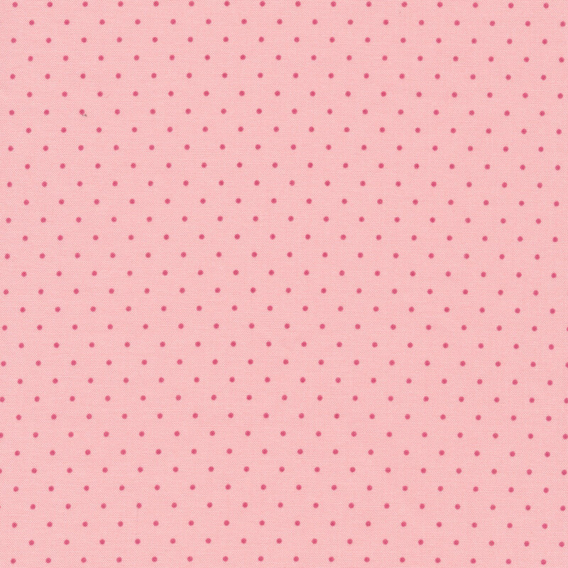 Light pink fabric with small dark pink polka dots all over