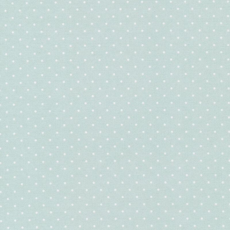 Light blue fabric with small white polka dots all over