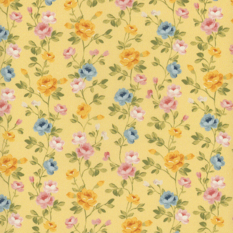 A bright yellow fabric with green vines full of golden yellow, pink, and blue roses.