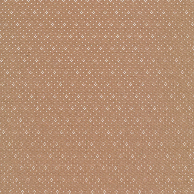 Light brown fabric with small white dots all over