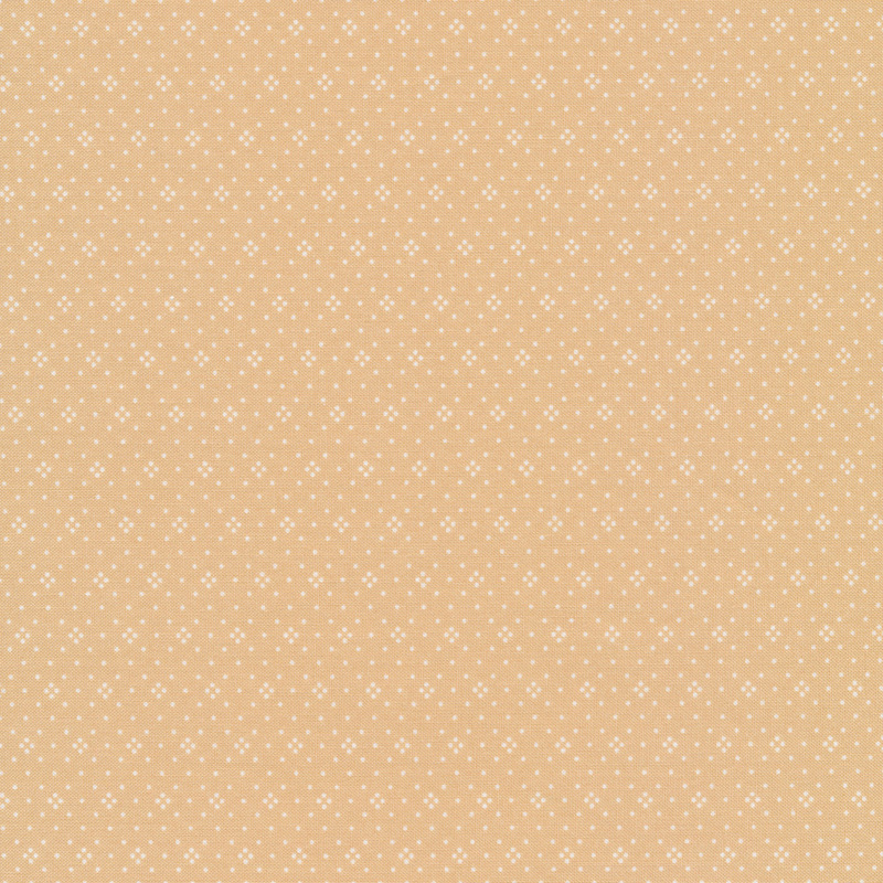 Light brown colored fabric with small white dots all over