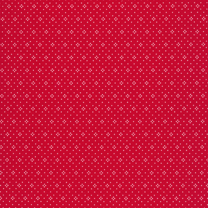 Red fabric with small white dots all over