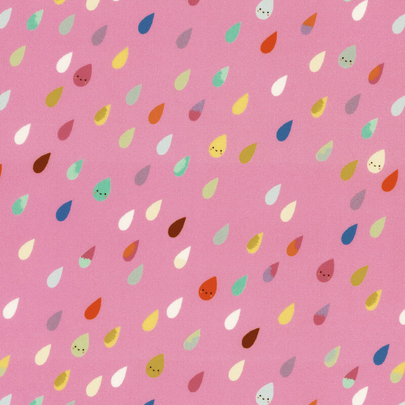A solid pink fabric with colorful smiling raindrops all over