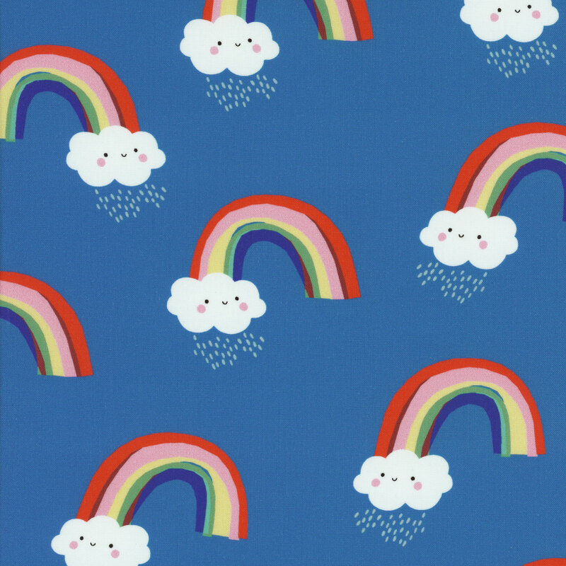 Children's fabric with smiling rainclouds and rainbows on a medium blue background