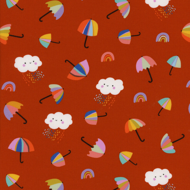 Children's fabric with ditsy smiling rainclouds, rainbows, and umbrellas on a red background