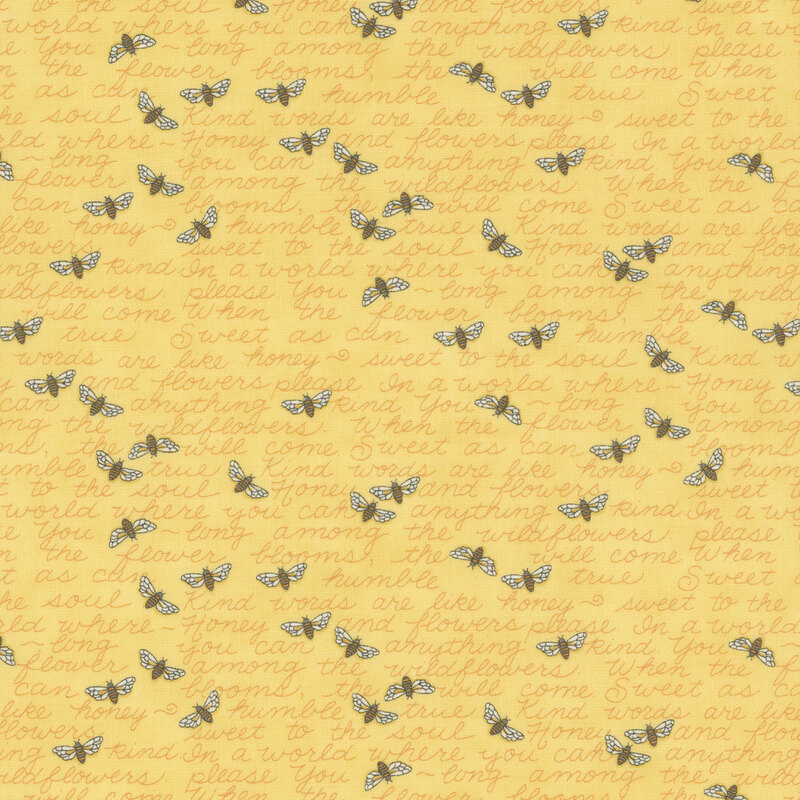 Yellow fabric with cursive words arranged in a steady line and bees buzzing across it