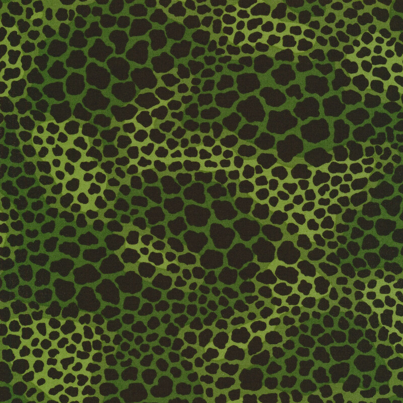 mottled green fabric with black leopard spots in varying sizes all over.