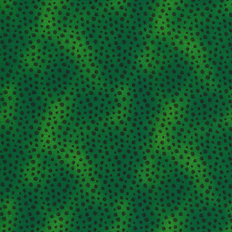 green mottled fabric with tiny black swirls all over