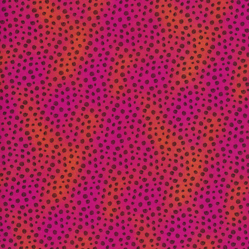 pink and orange mottled fabric with tiny black swirls all over