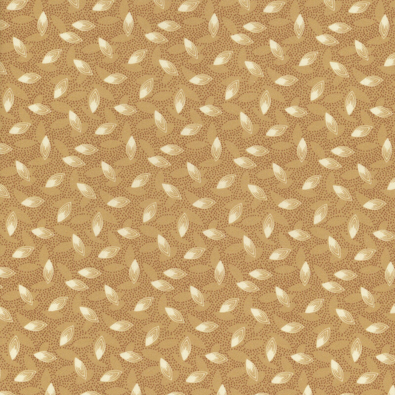 Sandy tan fabric with small dots and large white tossed seeds all over