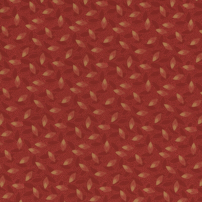 Red fabric with small dots and large tan tossed seeds all over