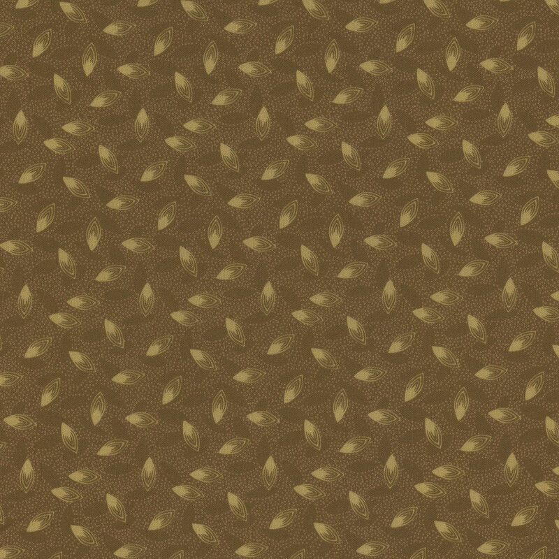 Green fabric with small dots and large tan tossed seeds all over