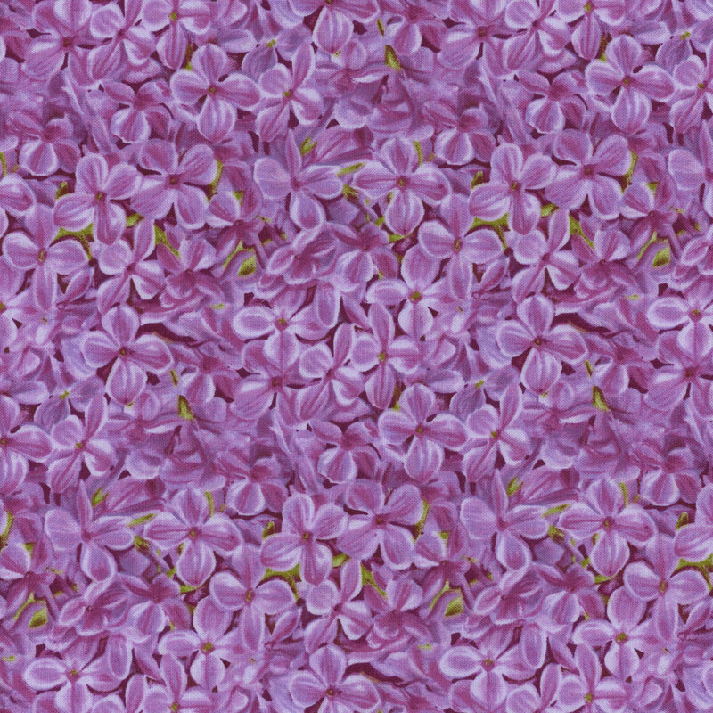 fabric with packed purple lilac blossoms