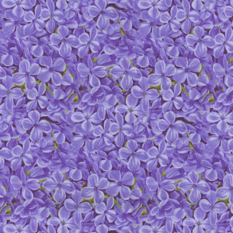 fabric with packed periwinkle lilac blossoms