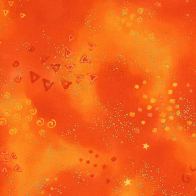 Orange mottled fabric with clustered gold metallic flecks and pale triangles, stars, and spirals