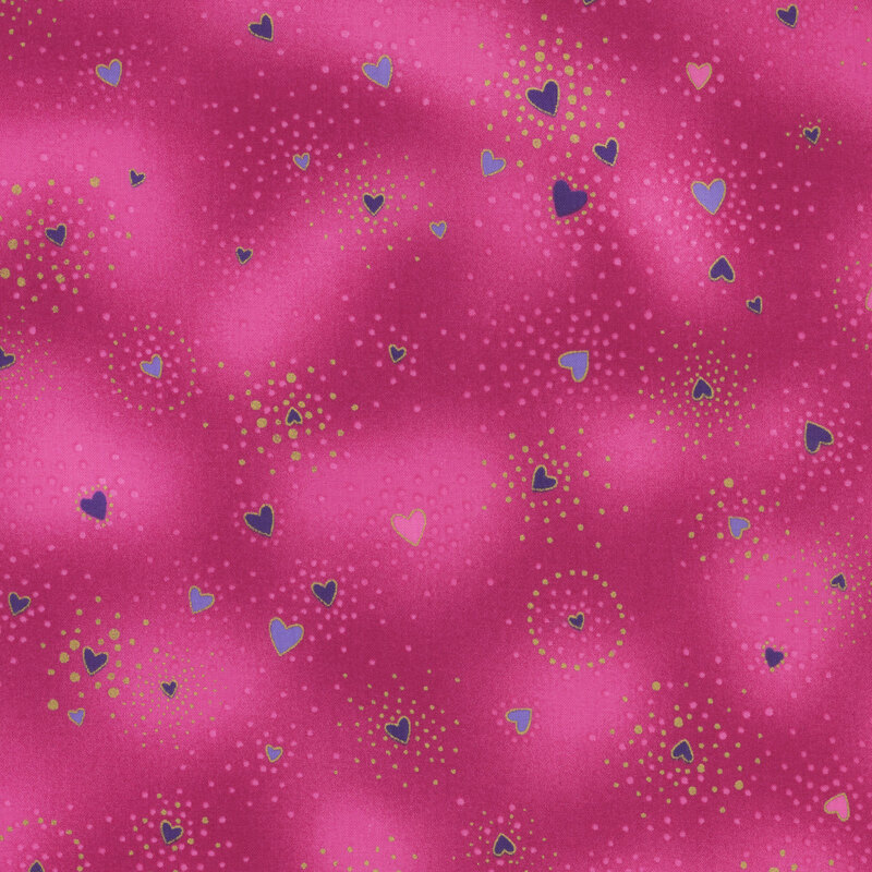 Pink mottled fabric with blue hearts tossed all over with clustered gold metallic flecks and pink dots