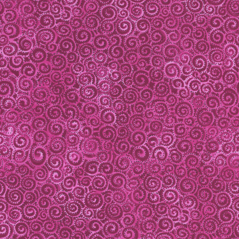 fuschia tonal fabric with small swirls packed together