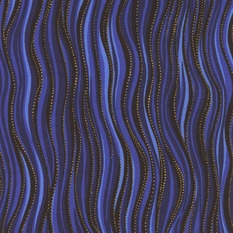 Blue fabric in varying shades with gold dot accents that follow wavy lines 