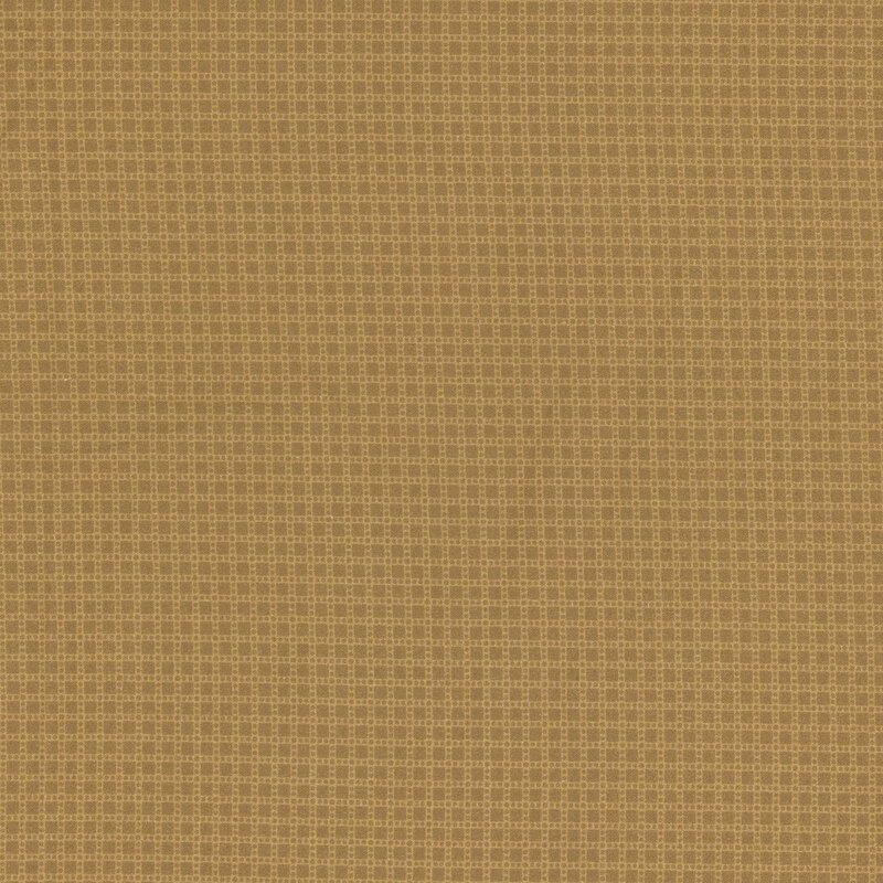 fabric featuring ditsy tan squares and dots on a light sage green background