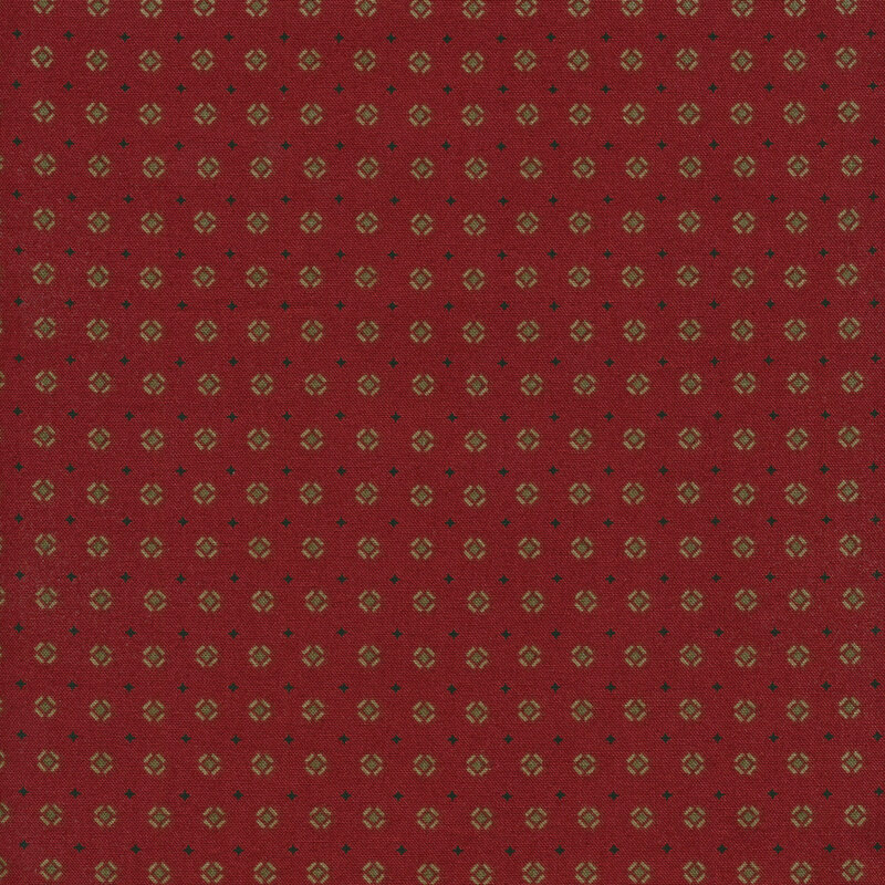 Red fabric with small geometric boxes and diamond stars