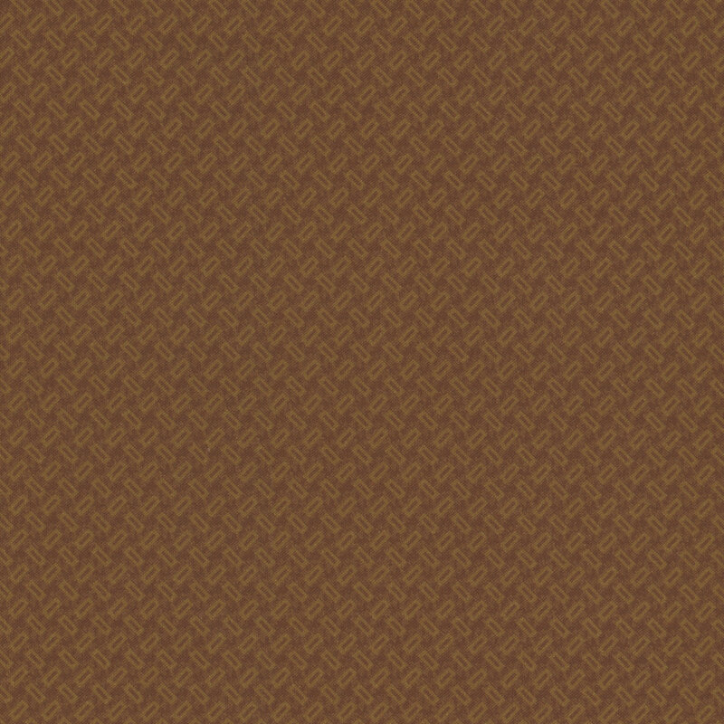 fabric featuring a woven pattern of green rectangles with a brown background.
