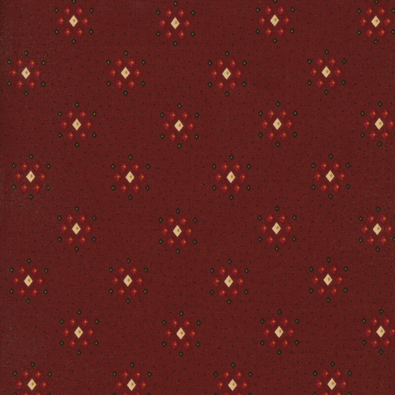 red colored fabric with small dots and clusters of multicolored diamonds