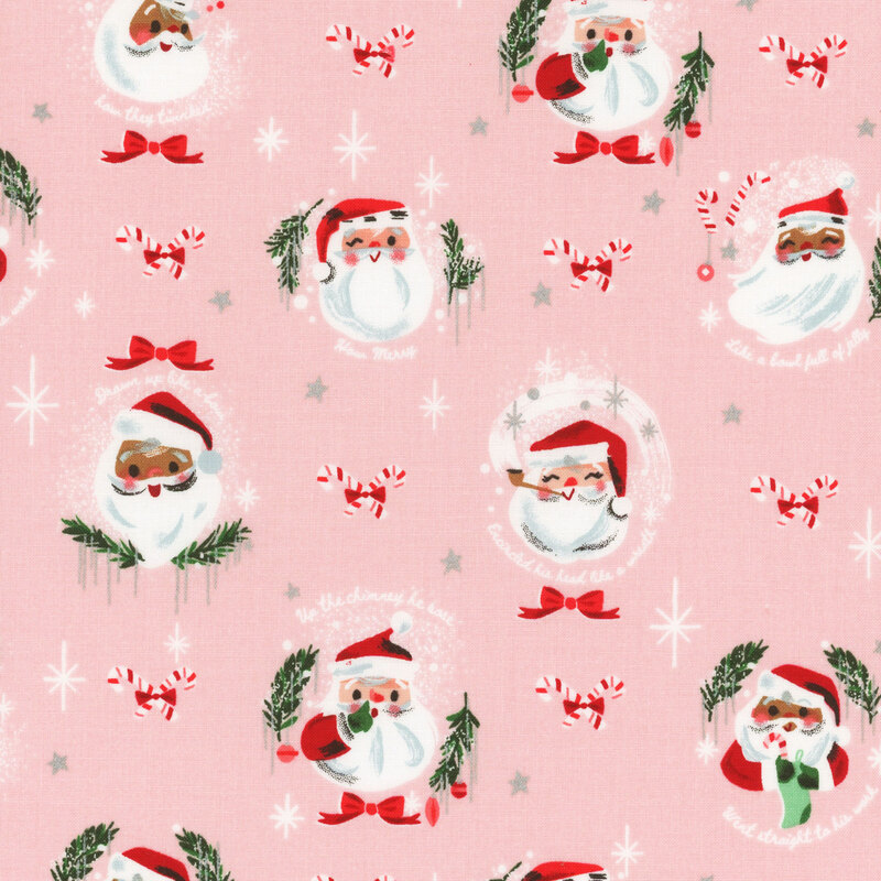 This fabric features adorable Santa motifs with Christmas sayings on a soft pink background with silver metallic accents.