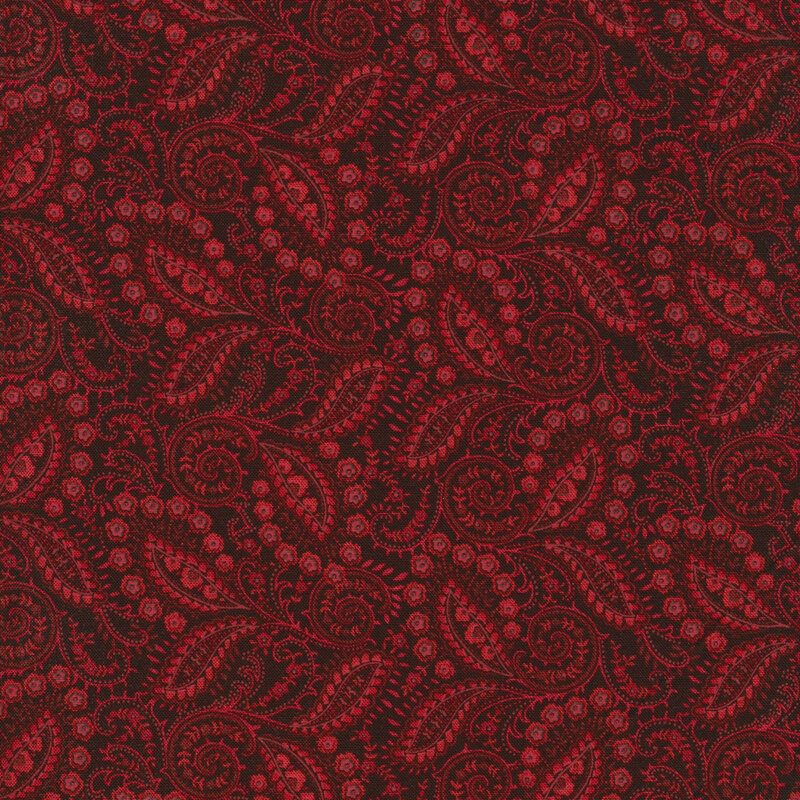 cranberry red fabric with lighter red paisley that looks like leaves
