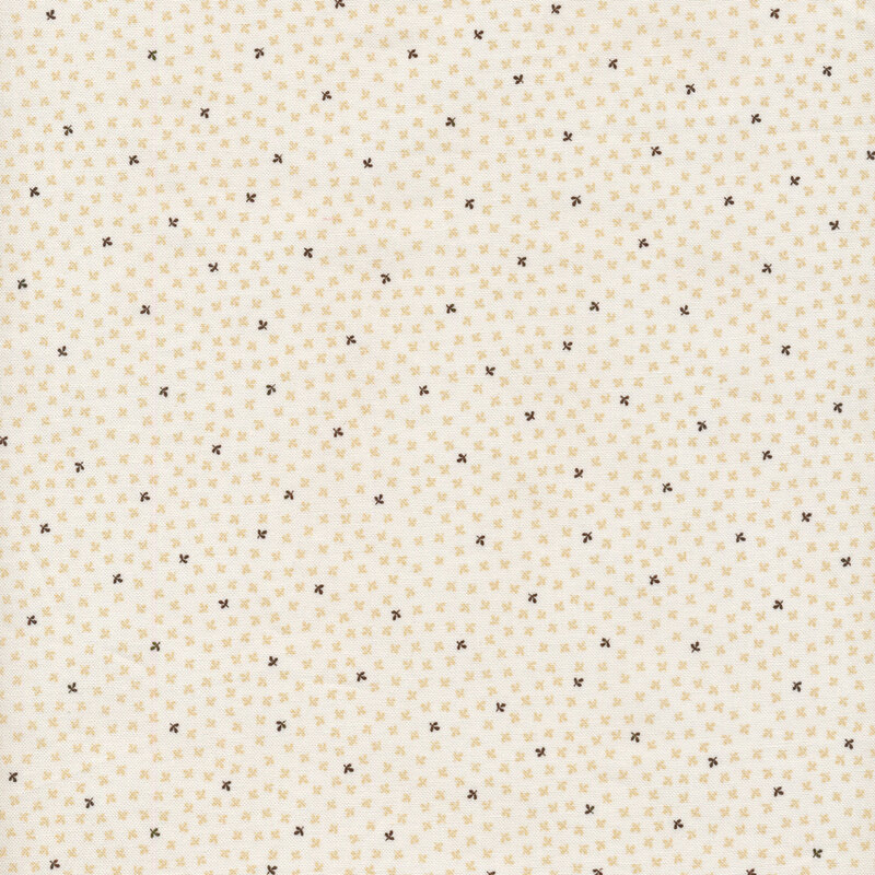 fabric with a cream background decorated with darker cream and black sprigs