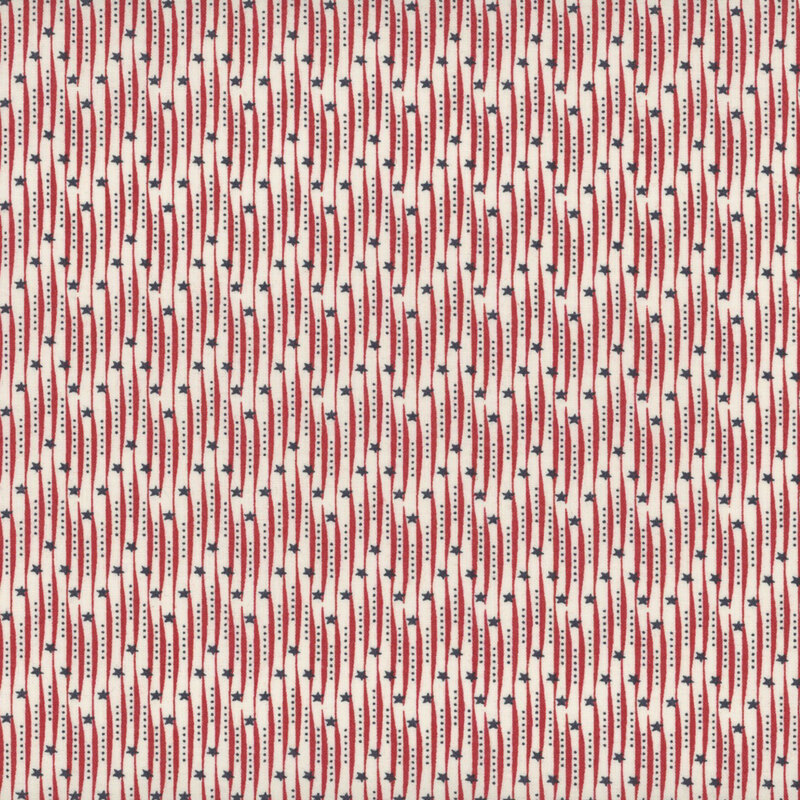 Fabric with red stripes and blue stars on a cream background.