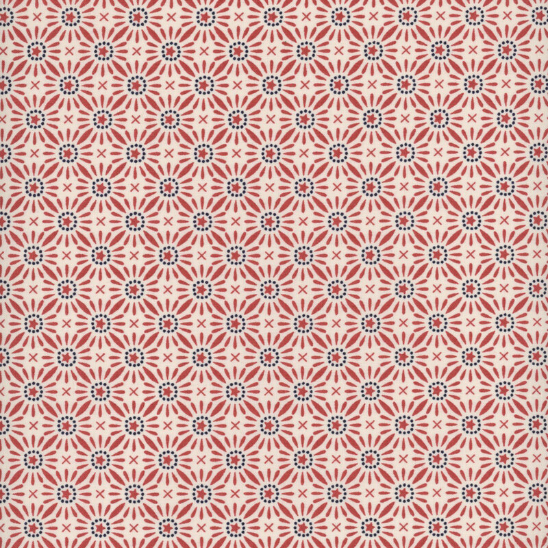 Fabric with a repeating tile motif of red stars in a dotted navy blue circle with red lines on a cream background.