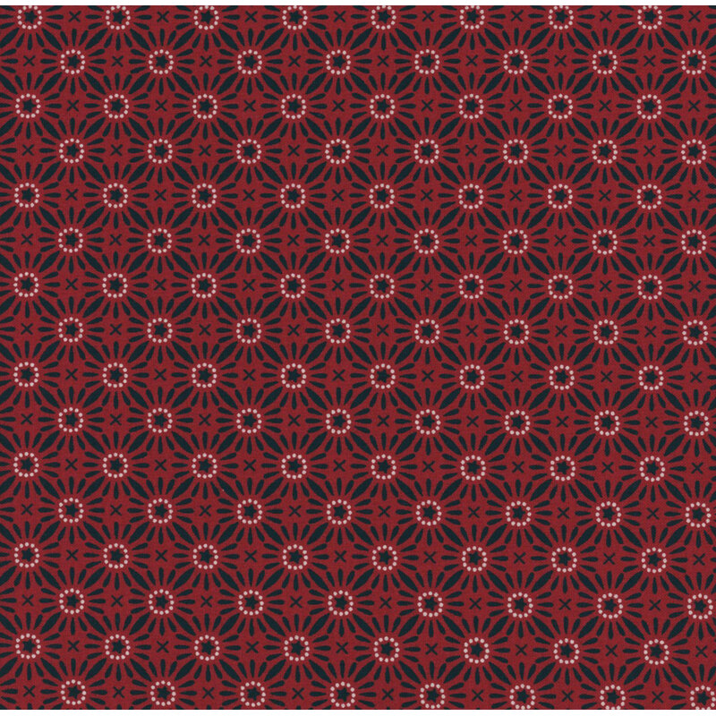 Fabric with a repeating tile motif of blue stars in a dotted cream blue circle with blue lines on a dark red background.