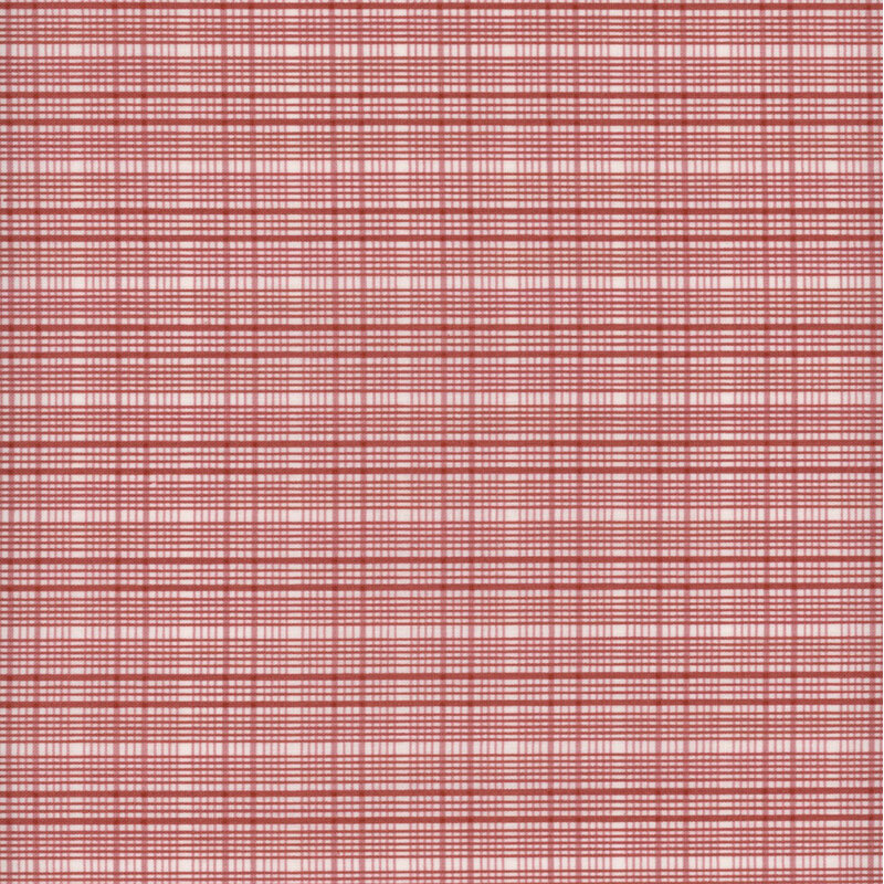 Fabric with a lovely light red and cream plaid print.
