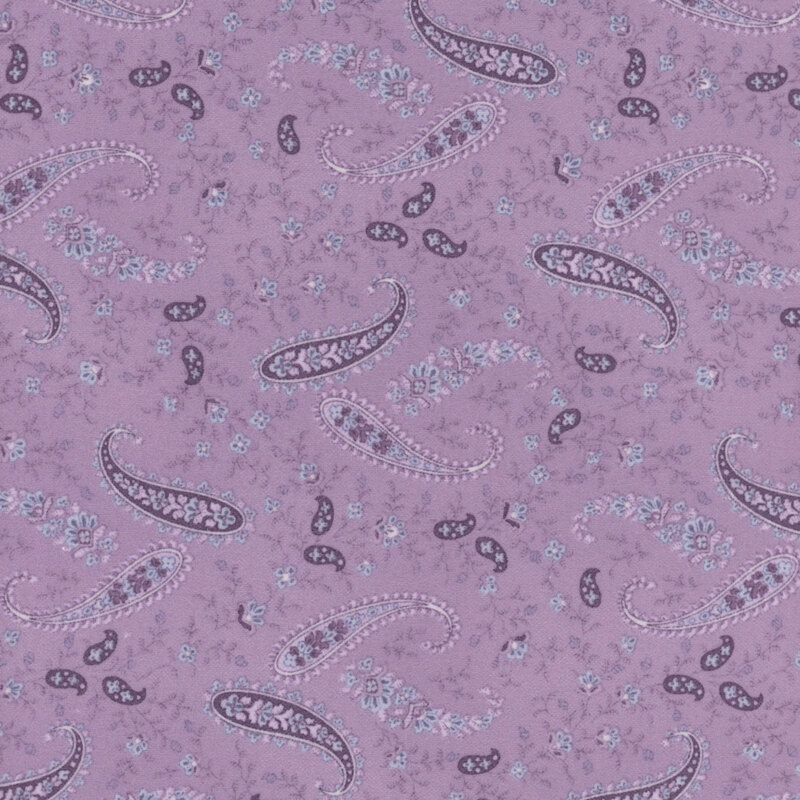 This fabric features purple paisley print with small flowers on a purple background.