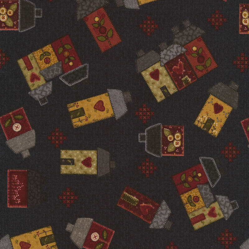 black fabric with houses meant to look like applique all across it