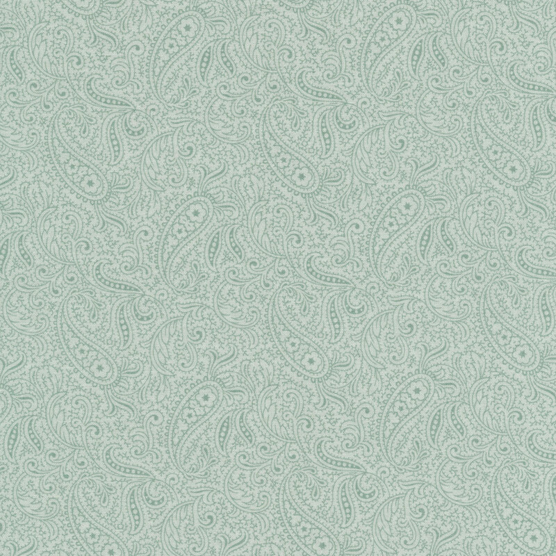Scan of light blue tonal fabric with a light paisley pattern