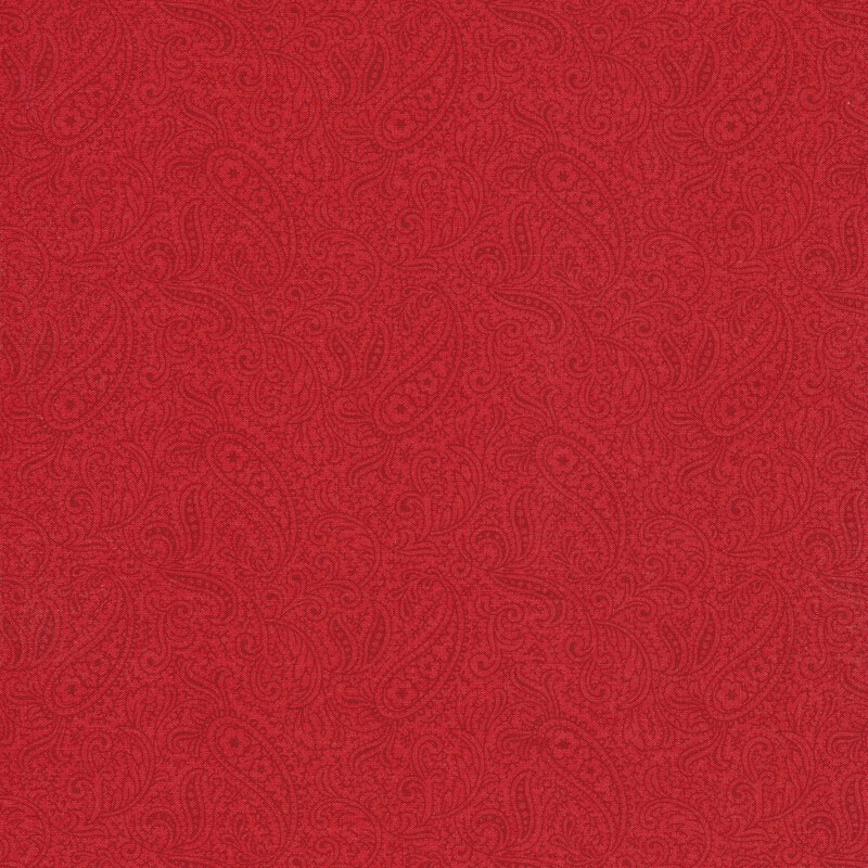 Scan of red tonal fabric with a light paisley pattern
