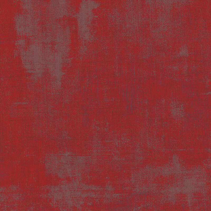 red and grey mottled and textured fabric