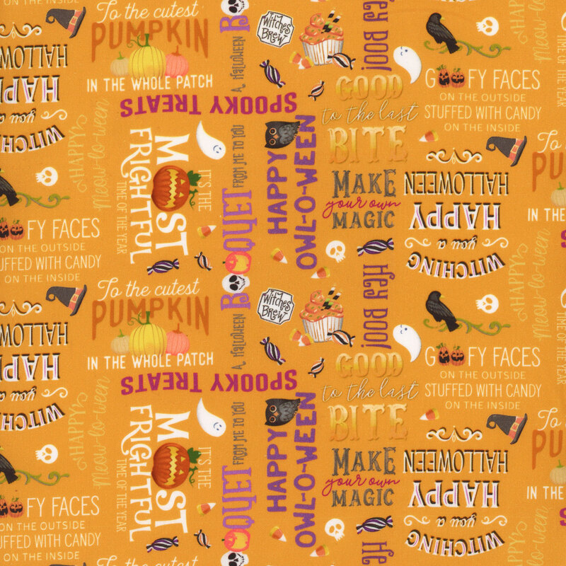 Bright orange fabric with halloween motifs and sayings across it