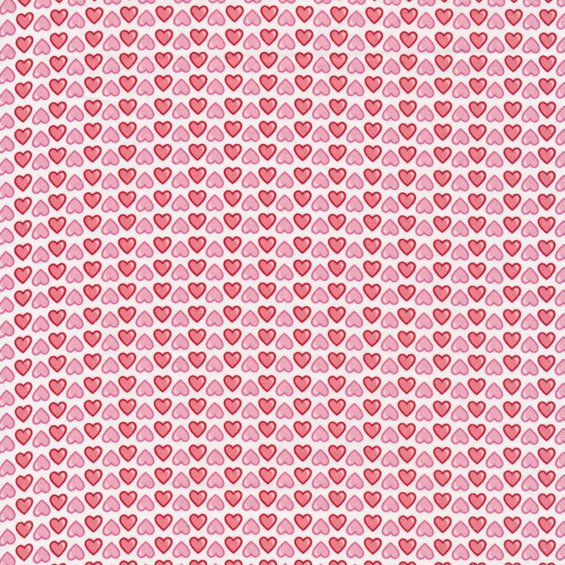This fabric features red and pink rows of hearts on a white background.