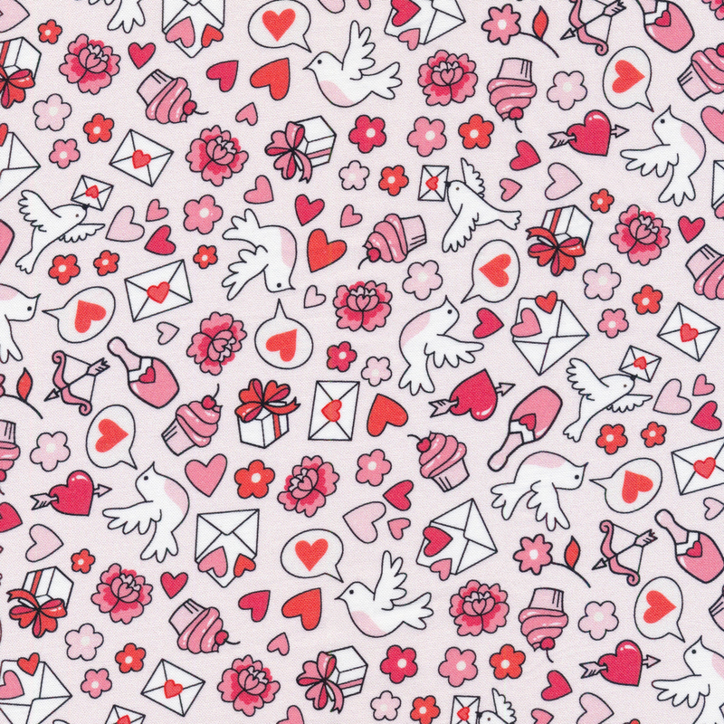 This fabric features presents, hearts, and various Valentine's Day motifs on a light pink background.