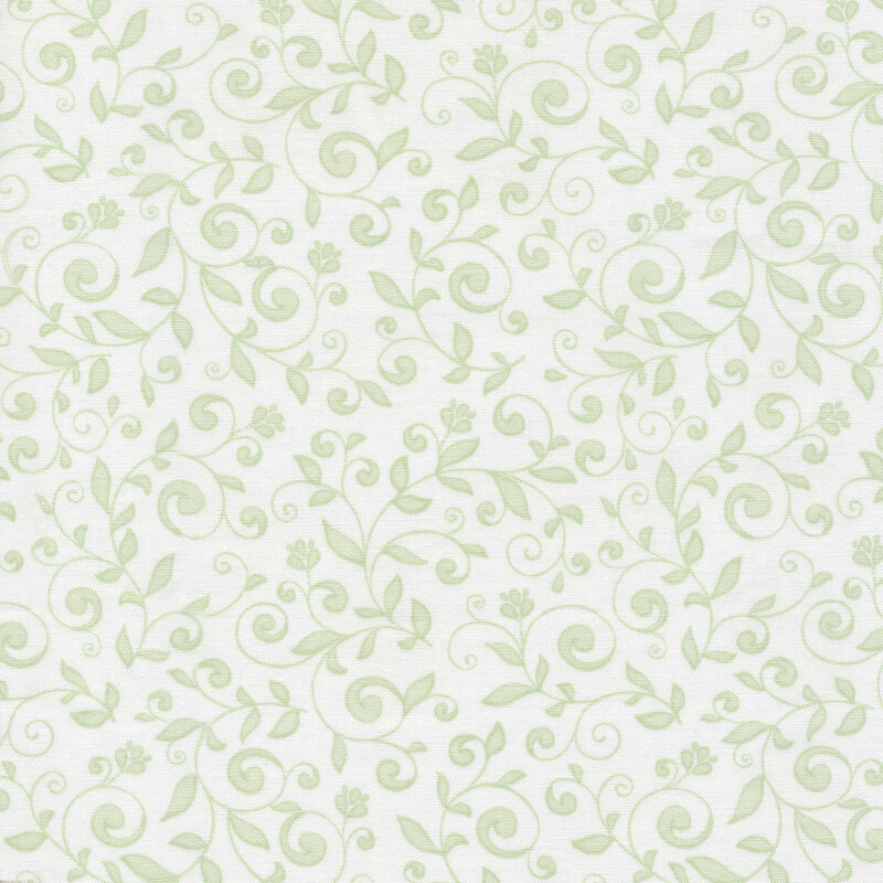 fabric featuring light green swirls and scrolls on a solid white background