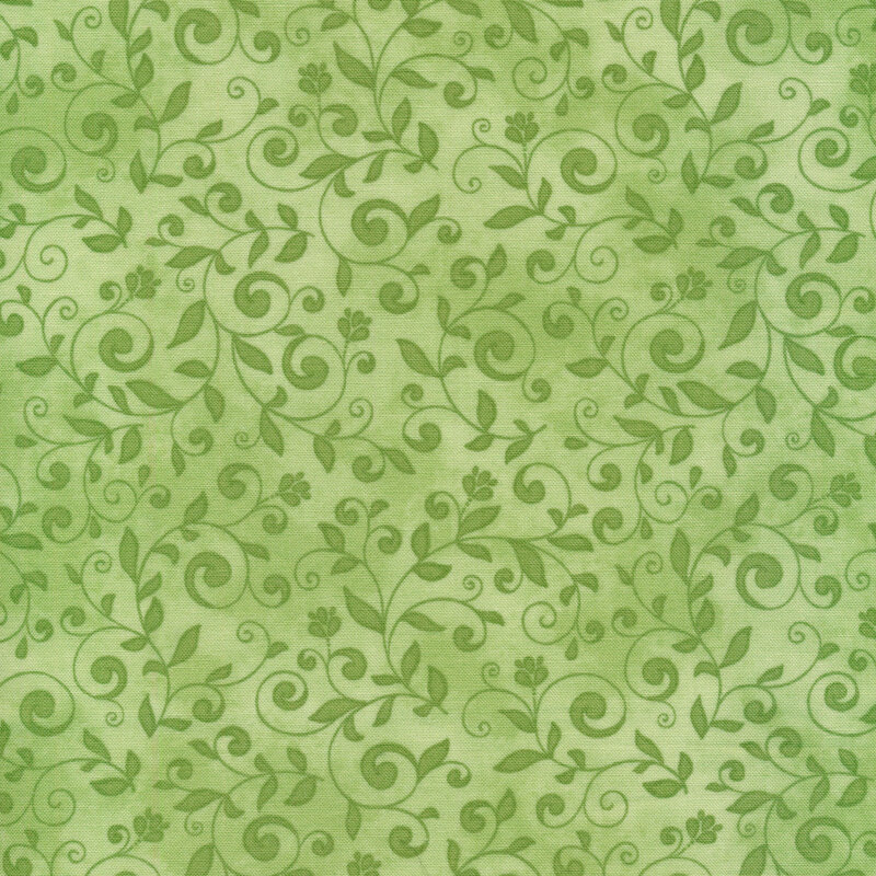 fabric featuring dark green scrolls and swirls on a lighter green background