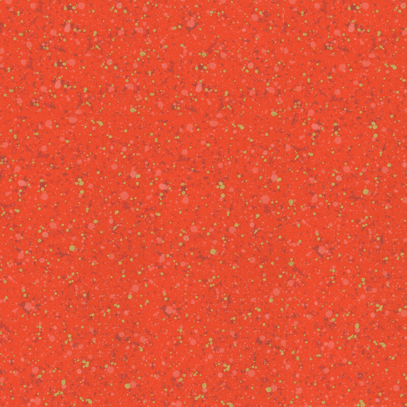 This fabric features red and gold metallic splatter pattern with a red-orange background.